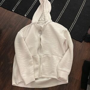 PACKAGE DEAL: All pictured athletic tops